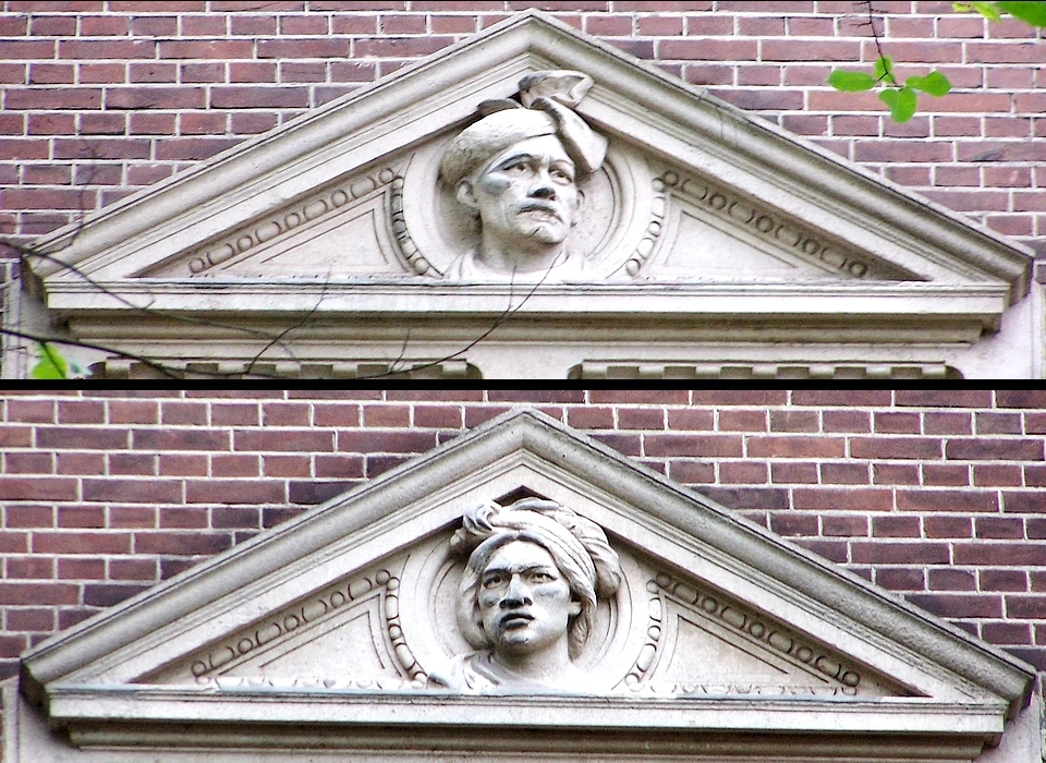 Linnaeusstraat 2a Culturele & Physische Antropologie timpaan boven raam links en rechts (2014)