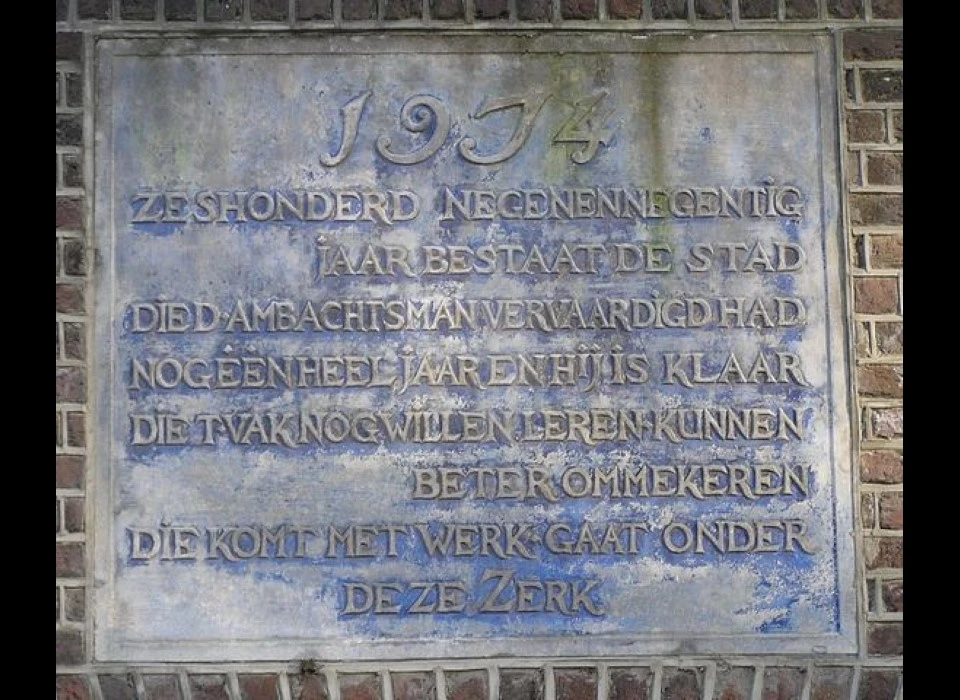 Nieuwe Uilenburgerstraat 91 restauratie-atelier gevelsteen boven ingang 699 jaar laatste jaar Hans 't Mannetje